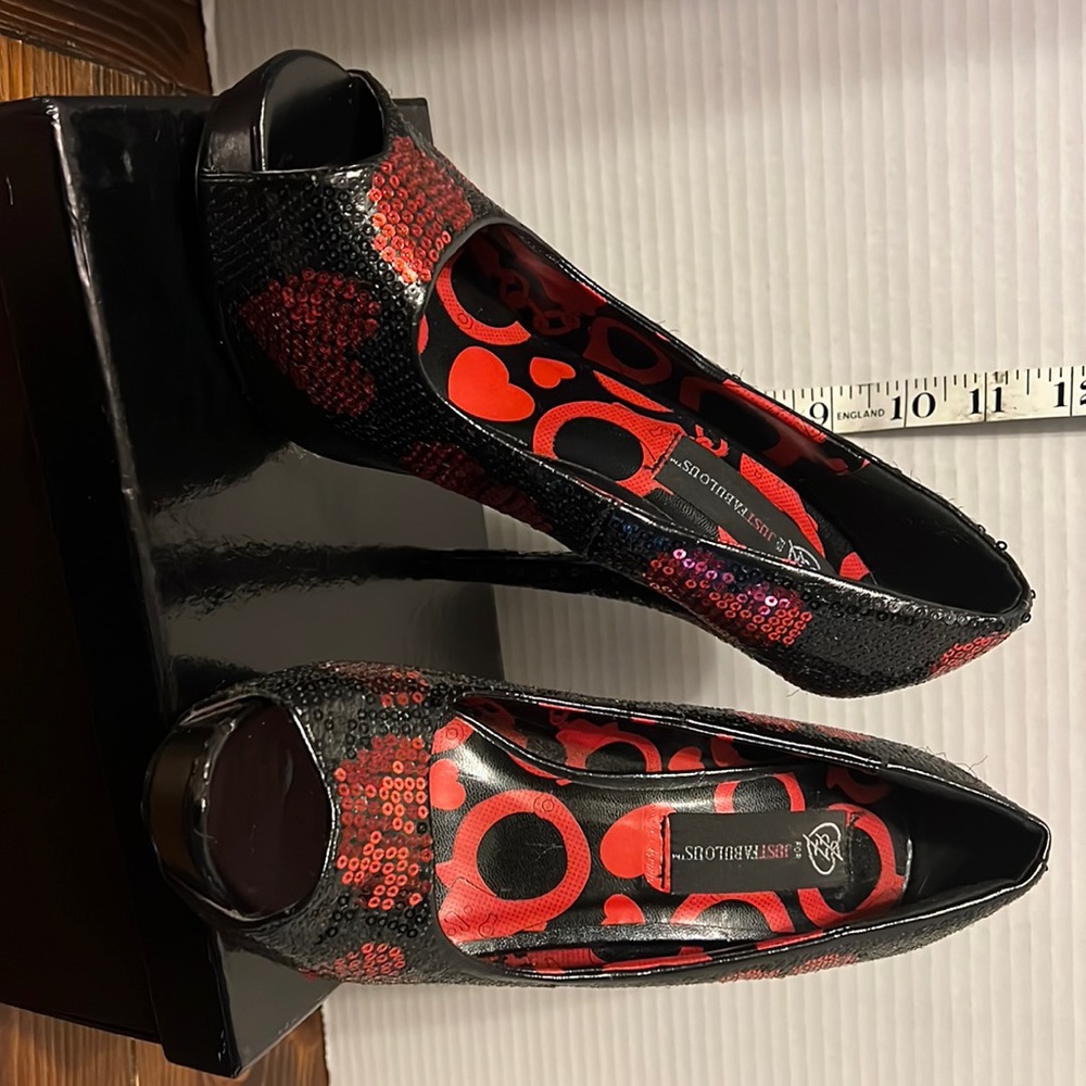 Just fabulous black and red heels. Size 8.